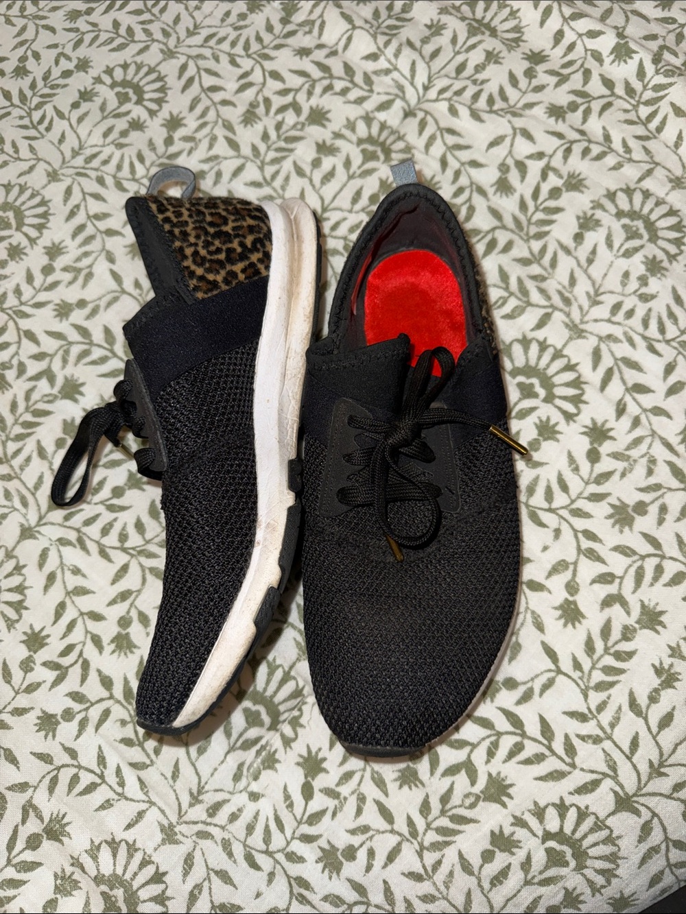 New Balance Black Sneakers with Leopard Heel Accent and Red Insole